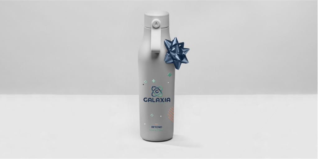 A white water bottle with a blue bow and "GALAXIA" branding on a plain background.